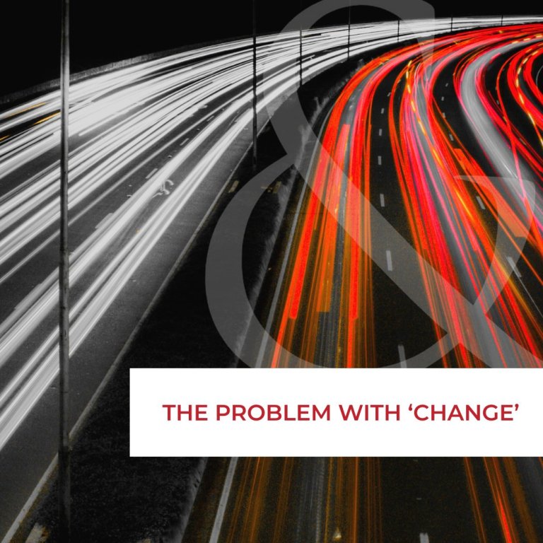 Night highway light trails in white and red with a white banner reading 'THE PROBLEM WITH CHANGE' across the bottom. It visualizes fast change for an article cover.